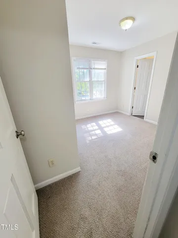 a view of a wooden deck with a trees