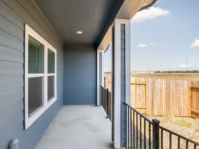 a bathroom with a shower sink and mirror