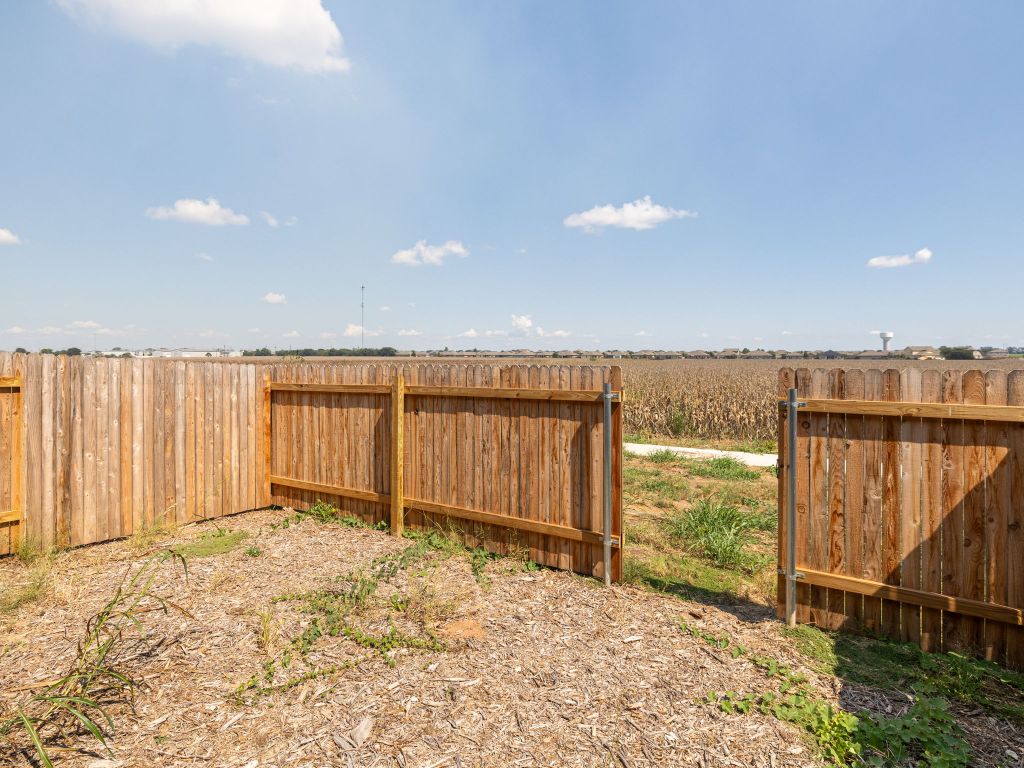 105 Texas Agate Drive, Unit 5 Kyle, TX 78640 - Photo 17 of 19 a view of a balcony