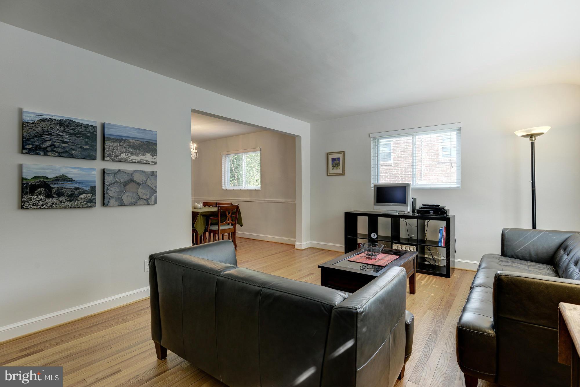 11004 Bucknell Drive Silver Spring, MD 20902 - Photo 2 of 30 a living room with furniture and wooden floor
