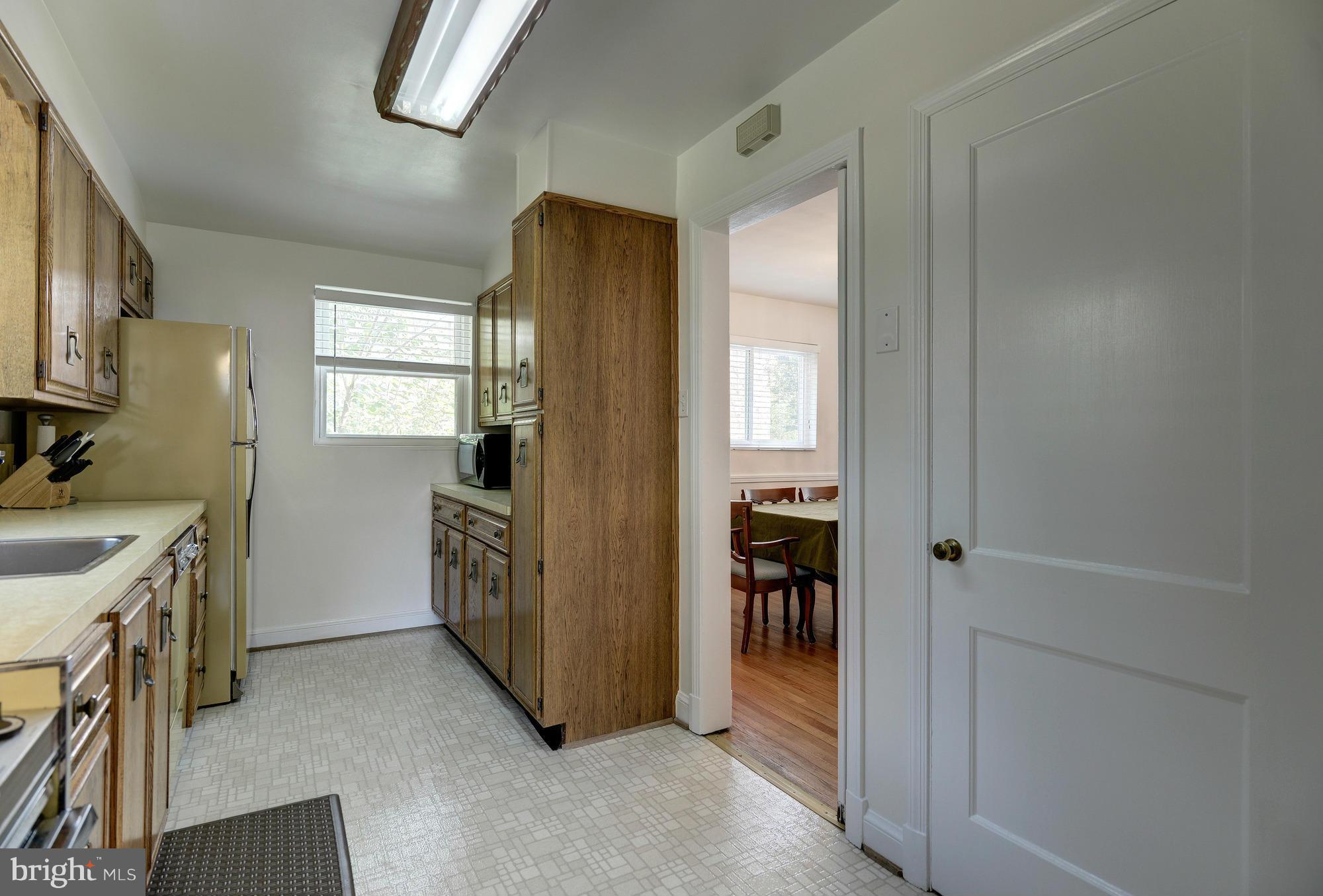11004 Bucknell Drive Silver Spring, MD 20902 - Photo 12 of 30 a bathroom with a sink and a mirror