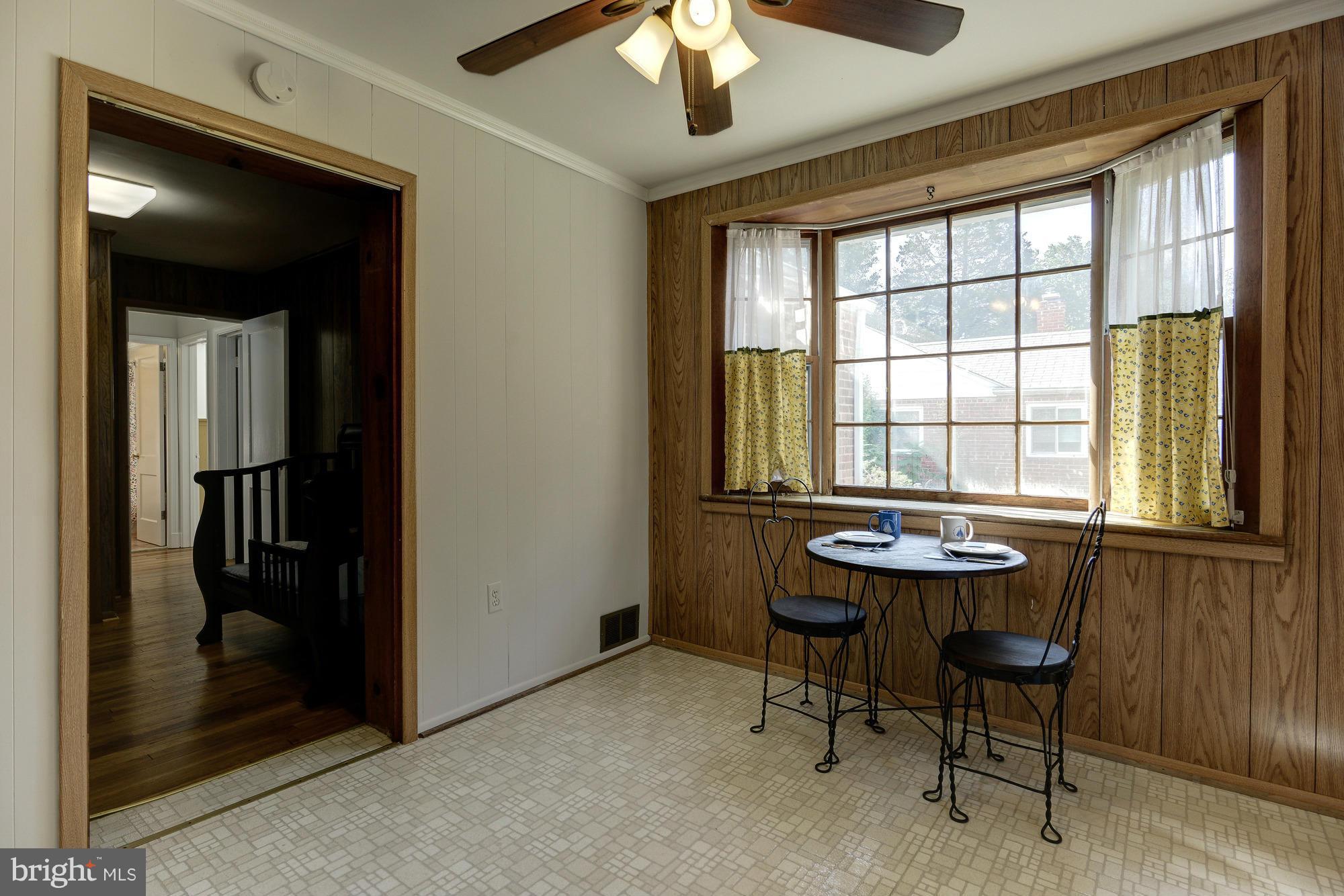 11004 Bucknell Drive Silver Spring, MD 20902 - Photo 15 of 30 a dining room with furniture and window