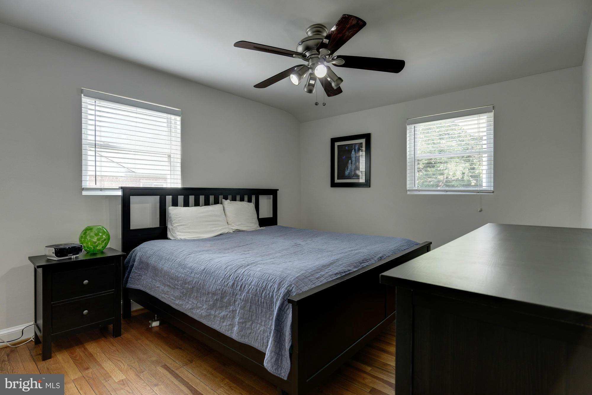 11004 Bucknell Drive Silver Spring, MD 20902 - Photo 17 of 30 a bedroom with a bed and a window
