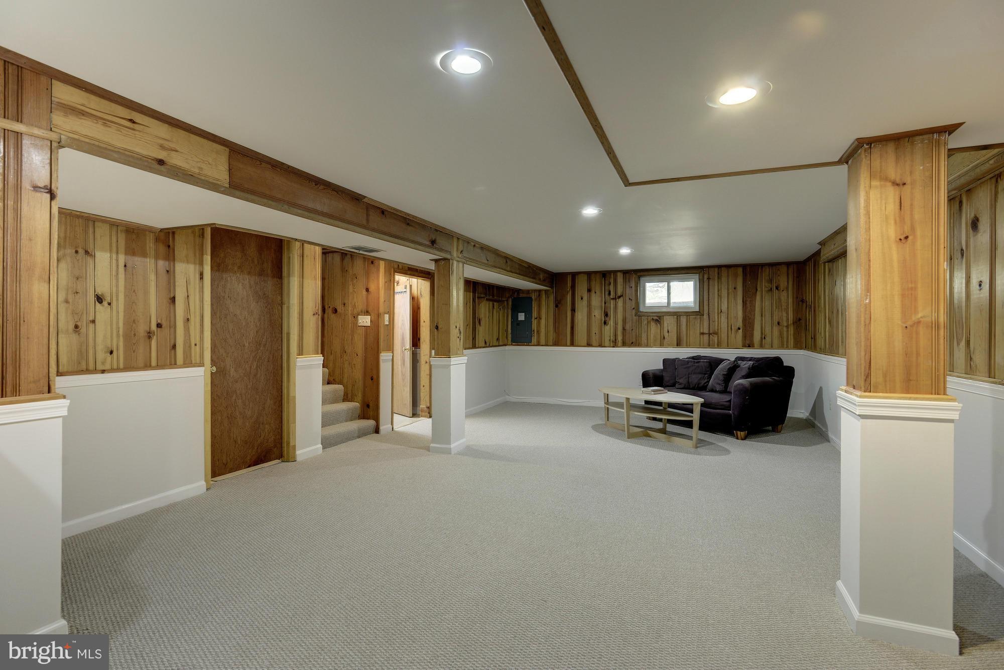 11004 Bucknell Drive Silver Spring, MD 20902 - Photo 25 of 30 a living room with furniture and a large window