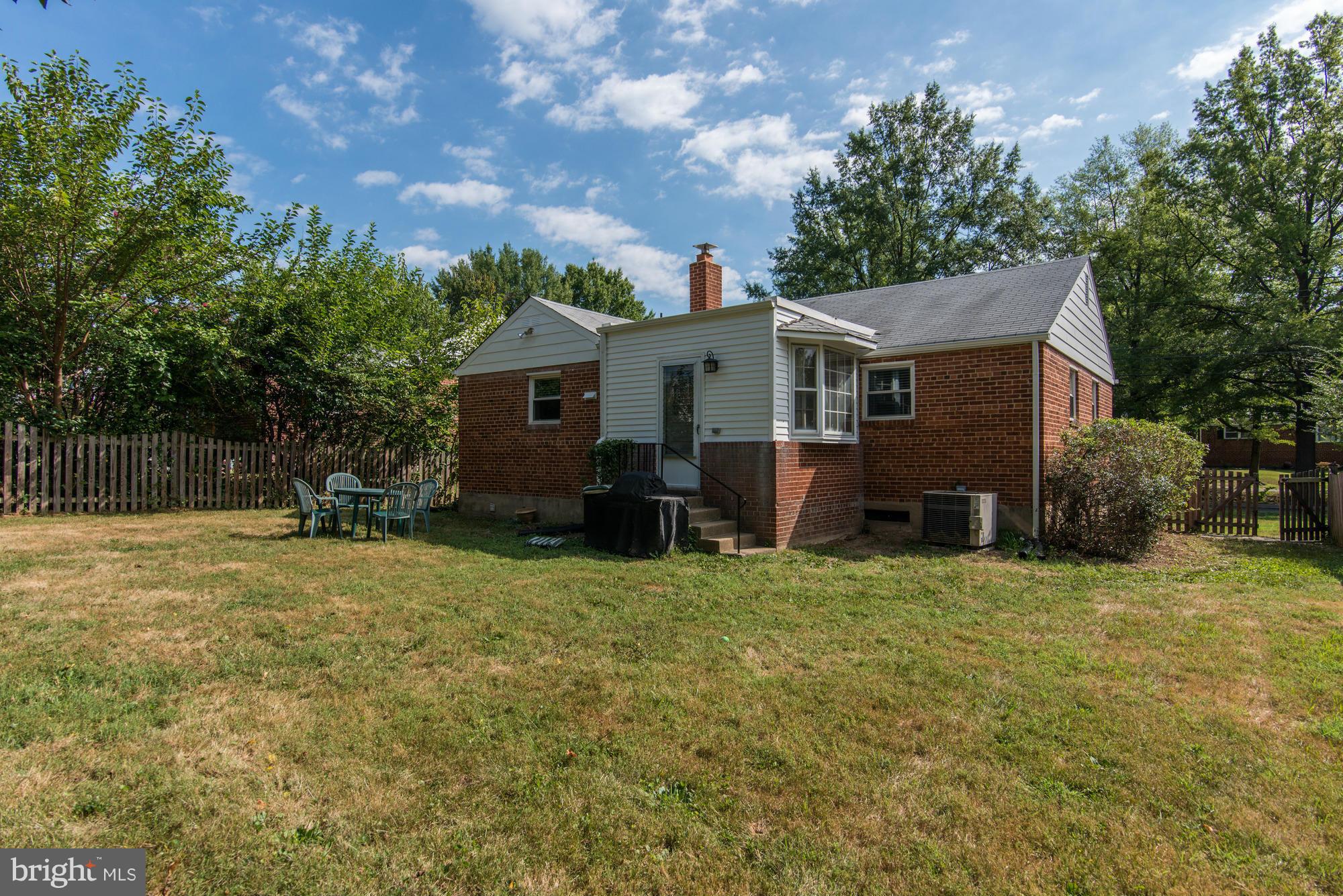 11004 Bucknell Drive Silver Spring, MD 20902 - Photo 29 of 30 front view of a house with a yard