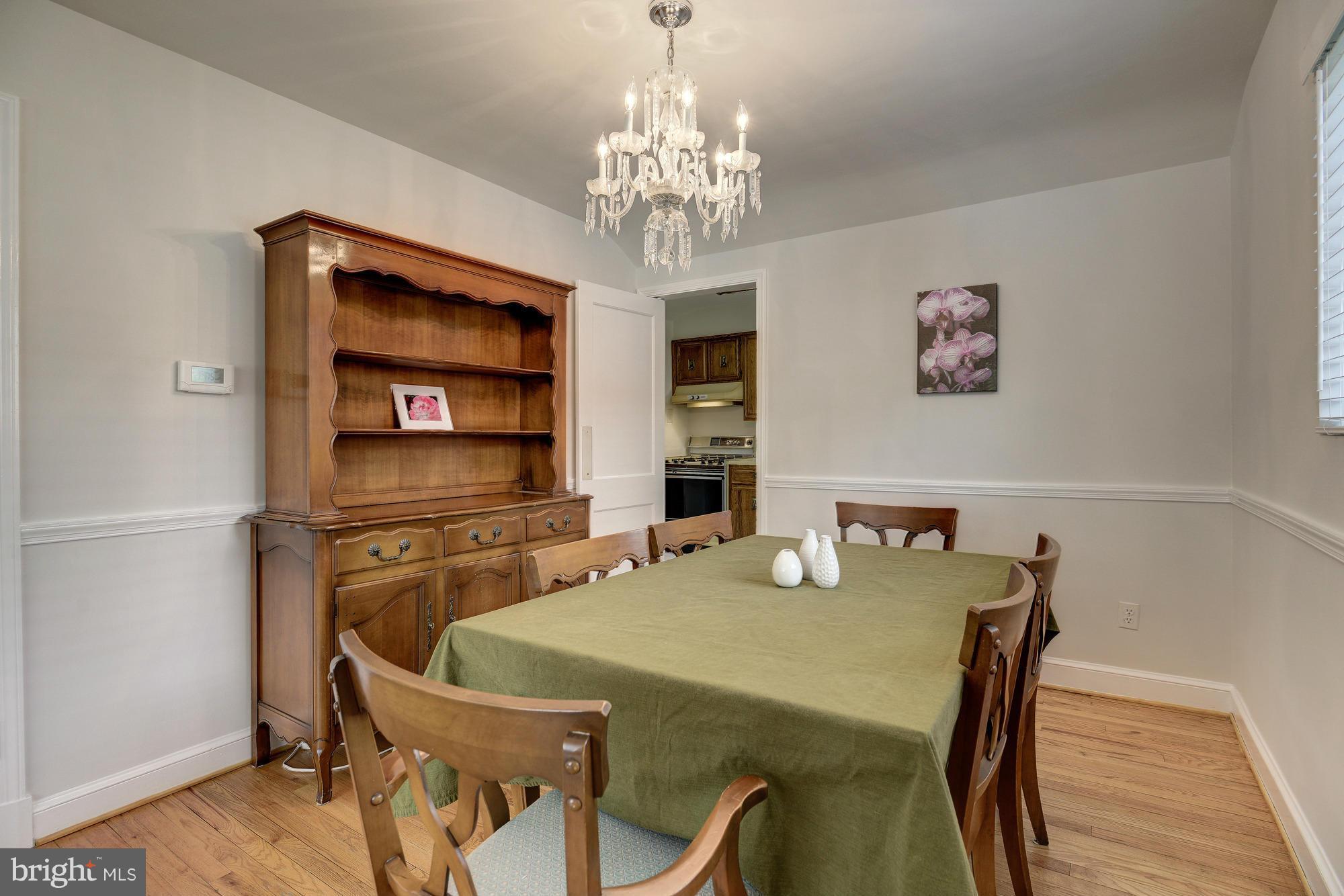 11004 Bucknell Drive Silver Spring, MD 20902 - Photo 8 of 30 a dining room with furniture and window