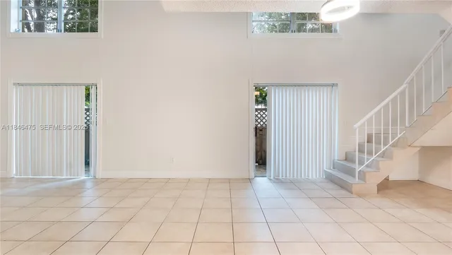 a view of an entryway with stairs