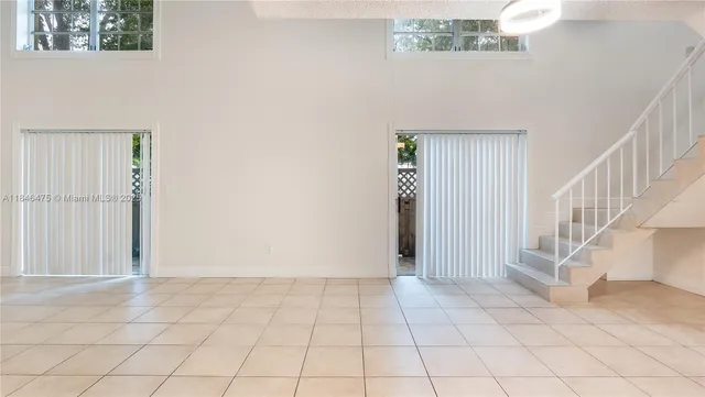 a view of an entryway with stairs