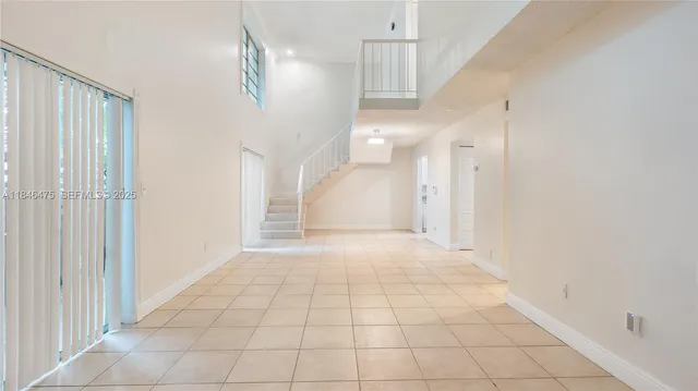 an empty room with white walls