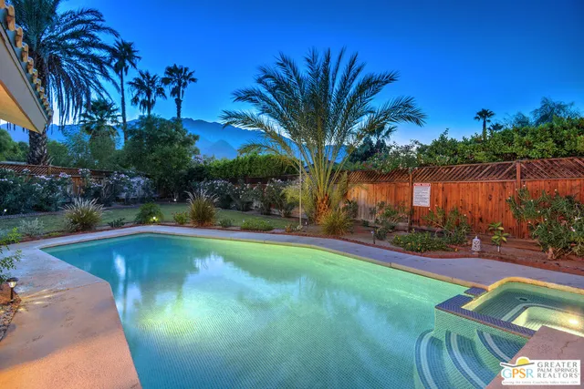 a view of a patio with a table chairs and a table