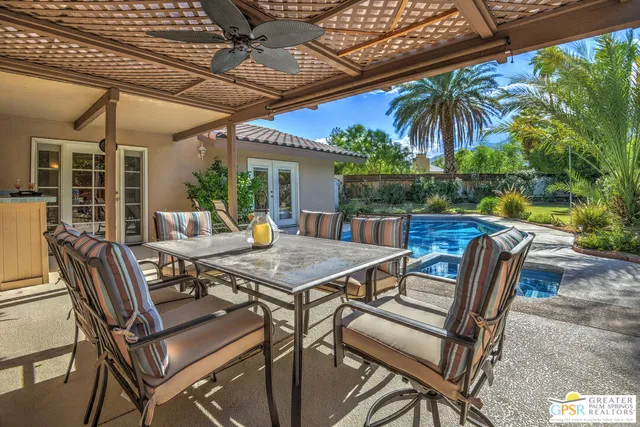 a view of a yard with a patio