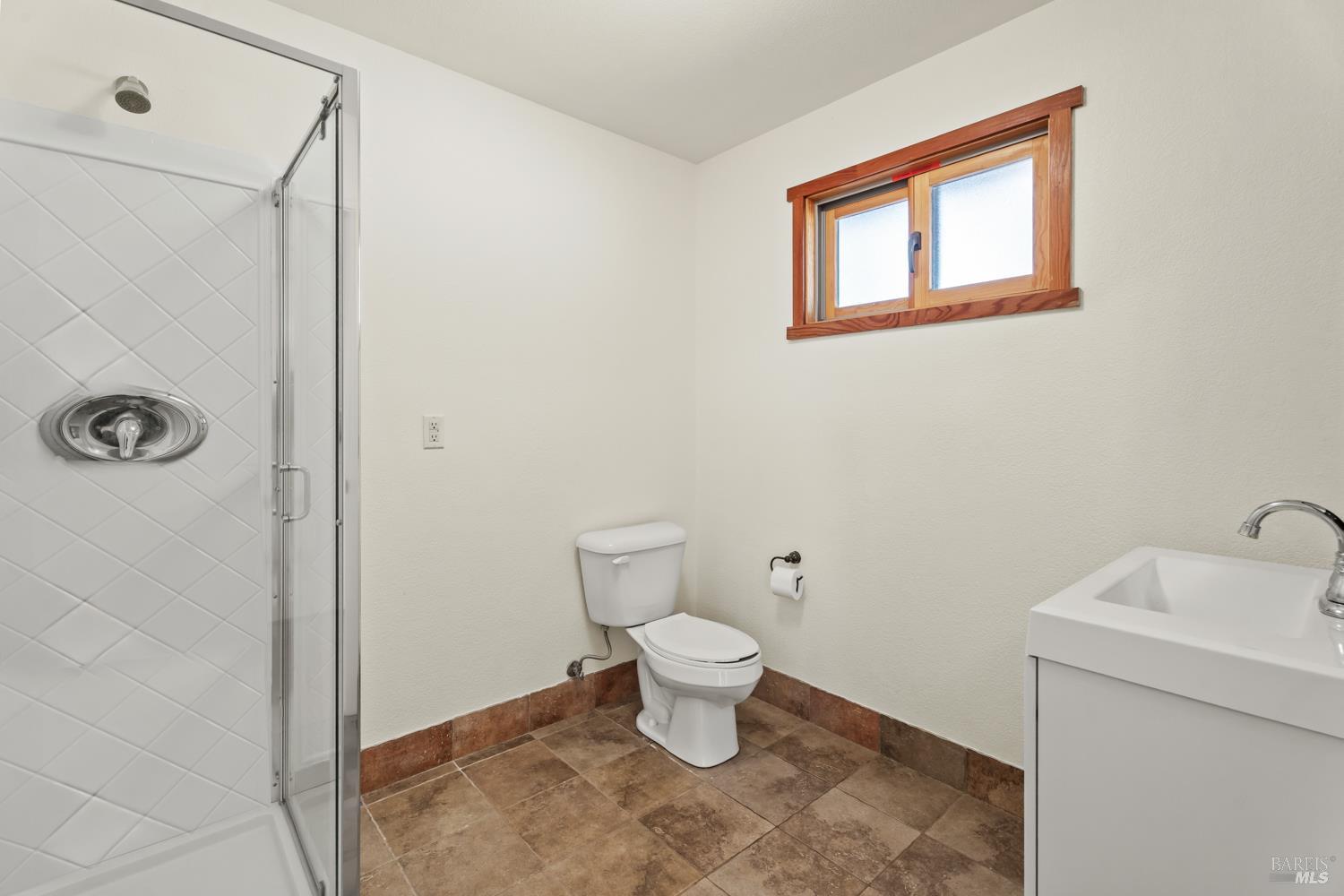 10185 East Road Redwood Valley, CA 95470 - Photo 11 of 17 a bathroom with a toilet and a sink