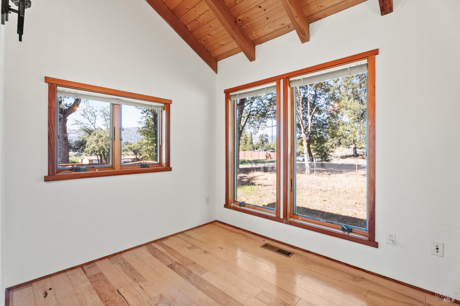 10185 East Road Redwood Valley, CA 95470 - Photo 5 of 17 a view of an empty room with a window