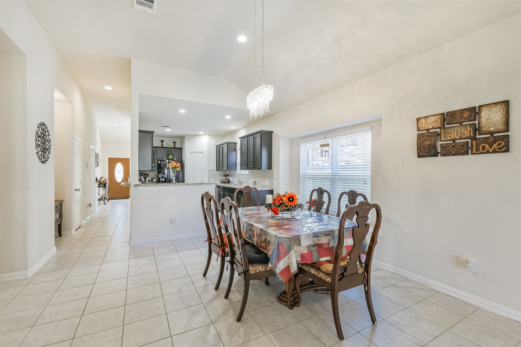 7527 Windsor Valley Lane Houston, TX 77049 - Photo 14 of 35 a view of a dining room with furniture