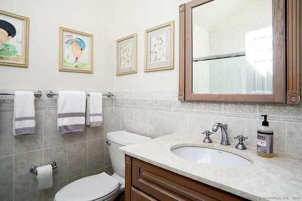 a bathroom with a sink and a toilet