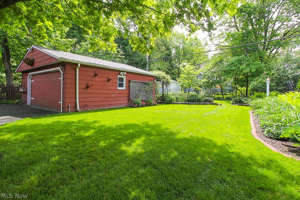 2894 Edgehill Road Cleveland, OH 44118 - Photo 31 of 35 A view of the large 2-car garage and the manicured landscape.