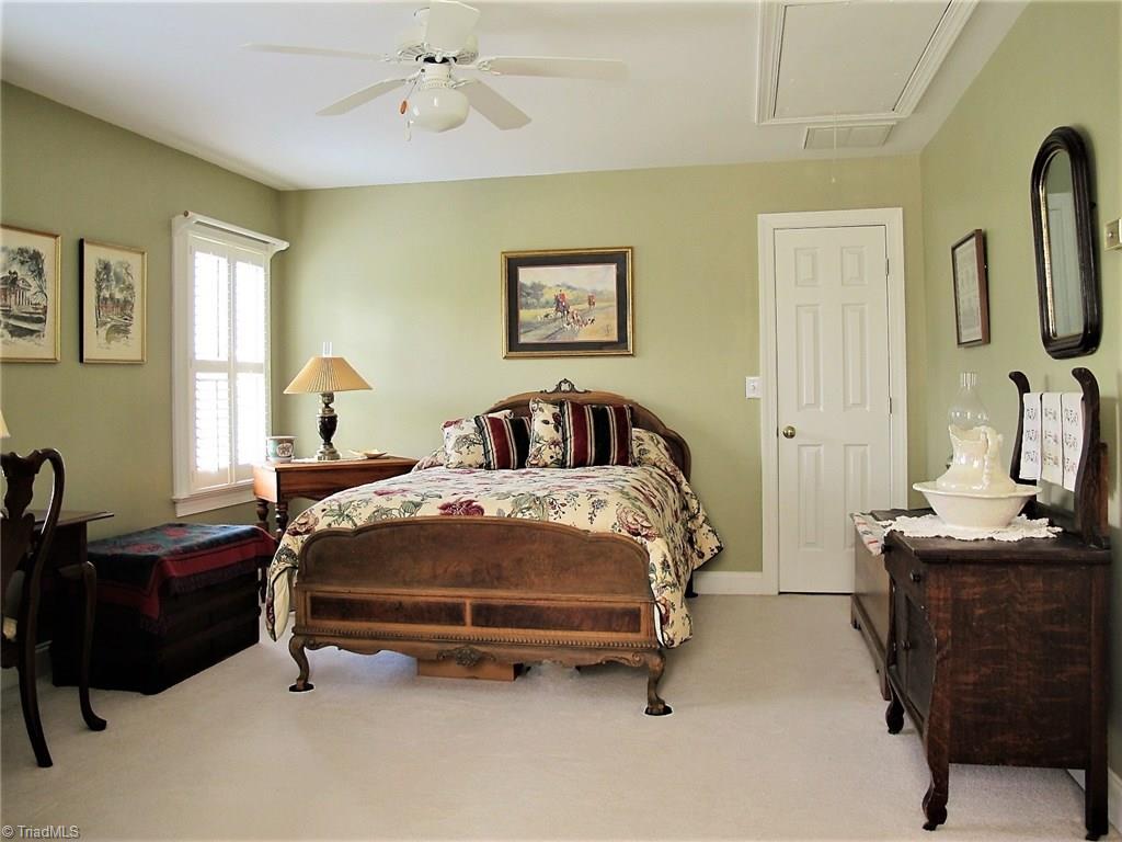 4365 Ebert Road Winston-Salem, NC 27127 - Photo 17 of 30 OVERSIZED SECONDARY BEDROOMS UPSTAIRS WITH WALK IN ATTIC ACCESS STORAGE AND WALK IN CLOSETS