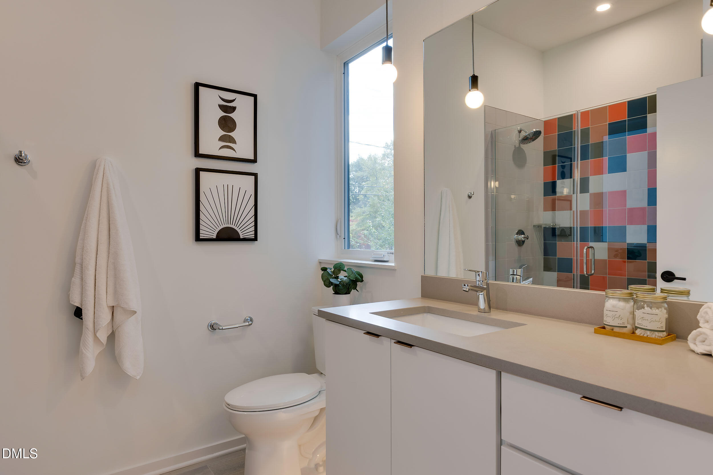 521 North Mangum Street, Unit 21 Durham, NC 27701 - Photo 13 of 21 a bathroom with a sink toilet and shower