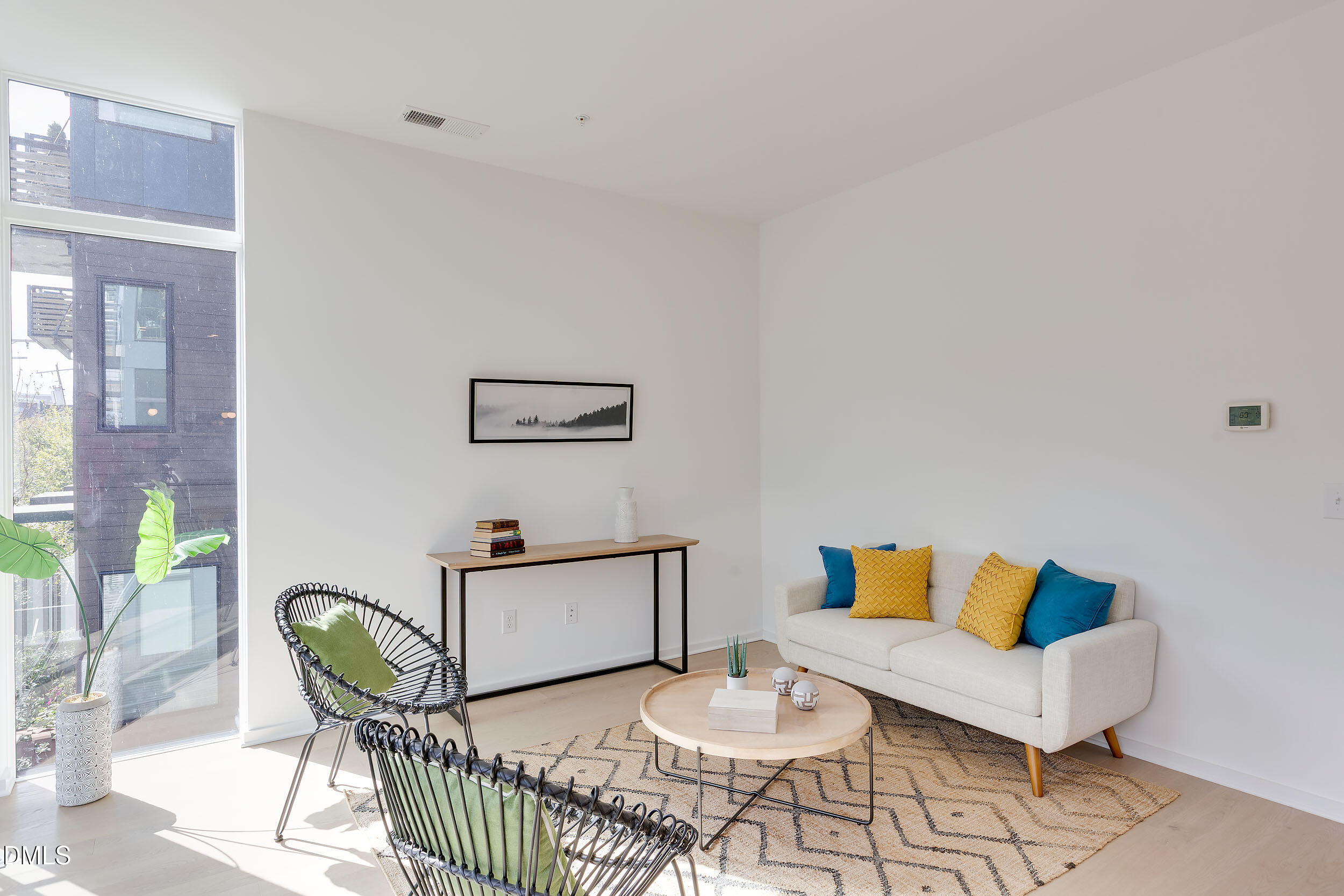 521 North Mangum Street, Unit 21 Durham, NC 27701 - Photo 2 of 21 a living room with furniture and wooden floor