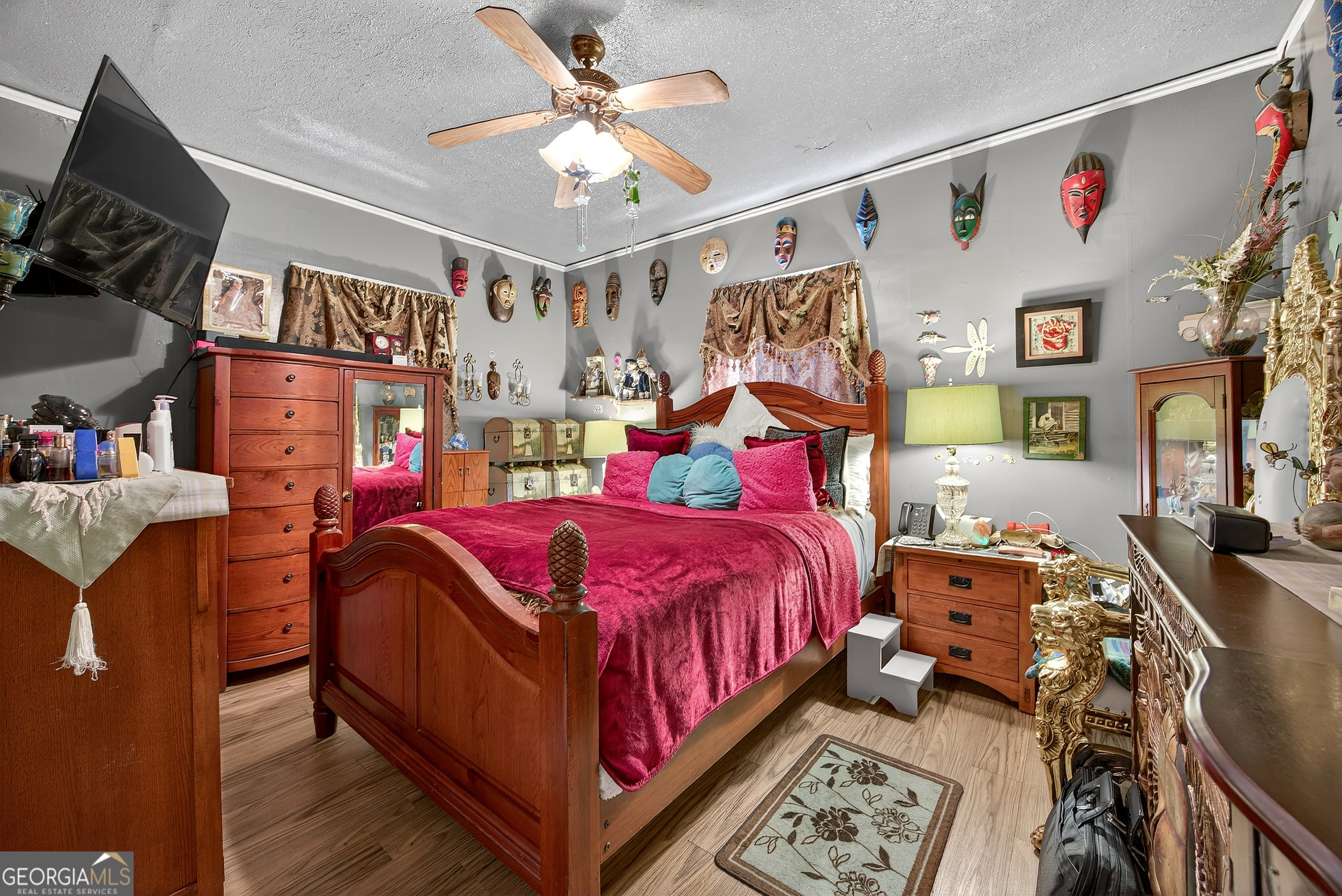1695 Beecher Street Southwest Atlanta, GA 30310 - Photo 11 of 23 a bedroom with bed and wooden floor