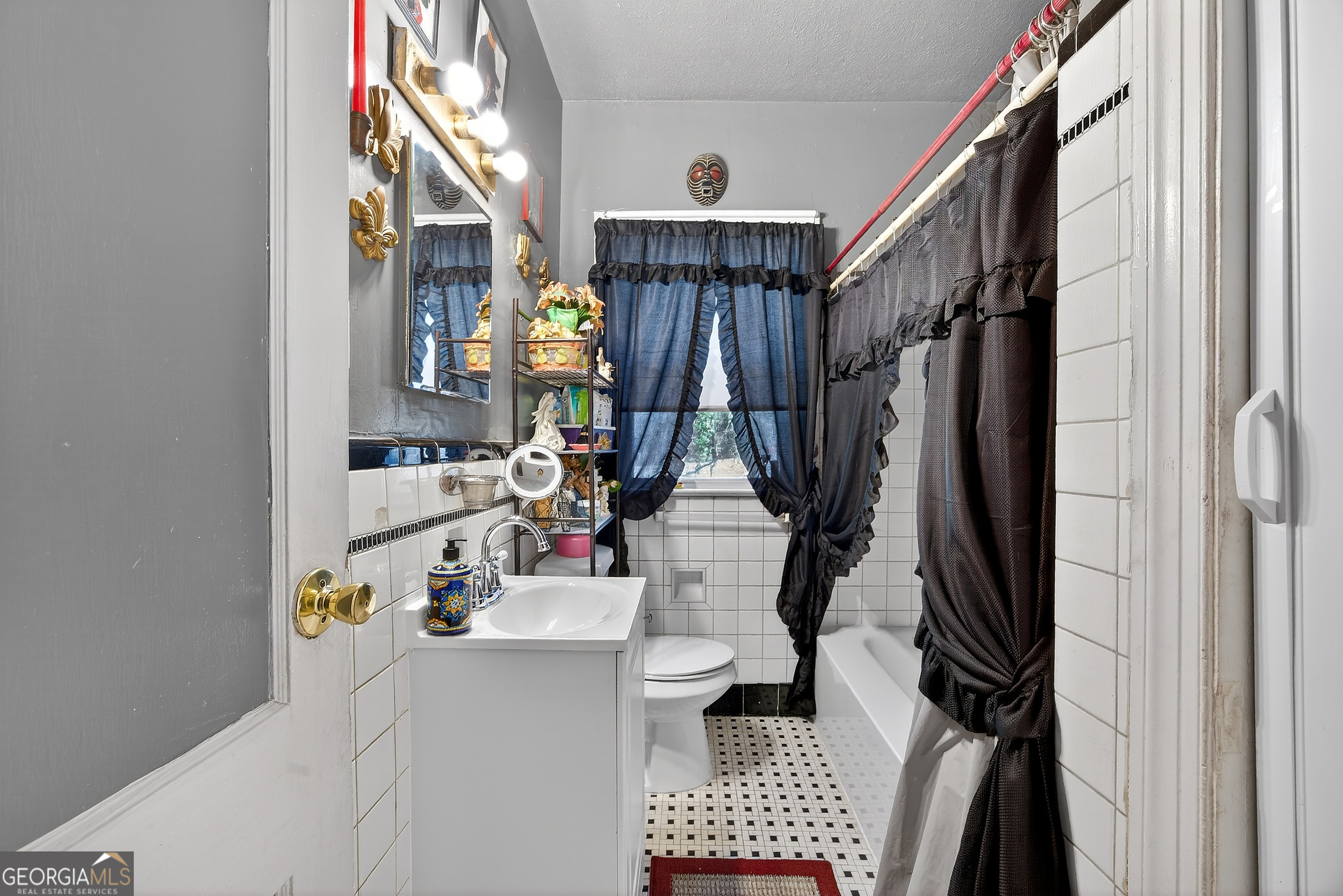 1695 Beecher Street Southwest Atlanta, GA 30310 - Photo 13 of 23 a bathroom with a sink toilet and shower