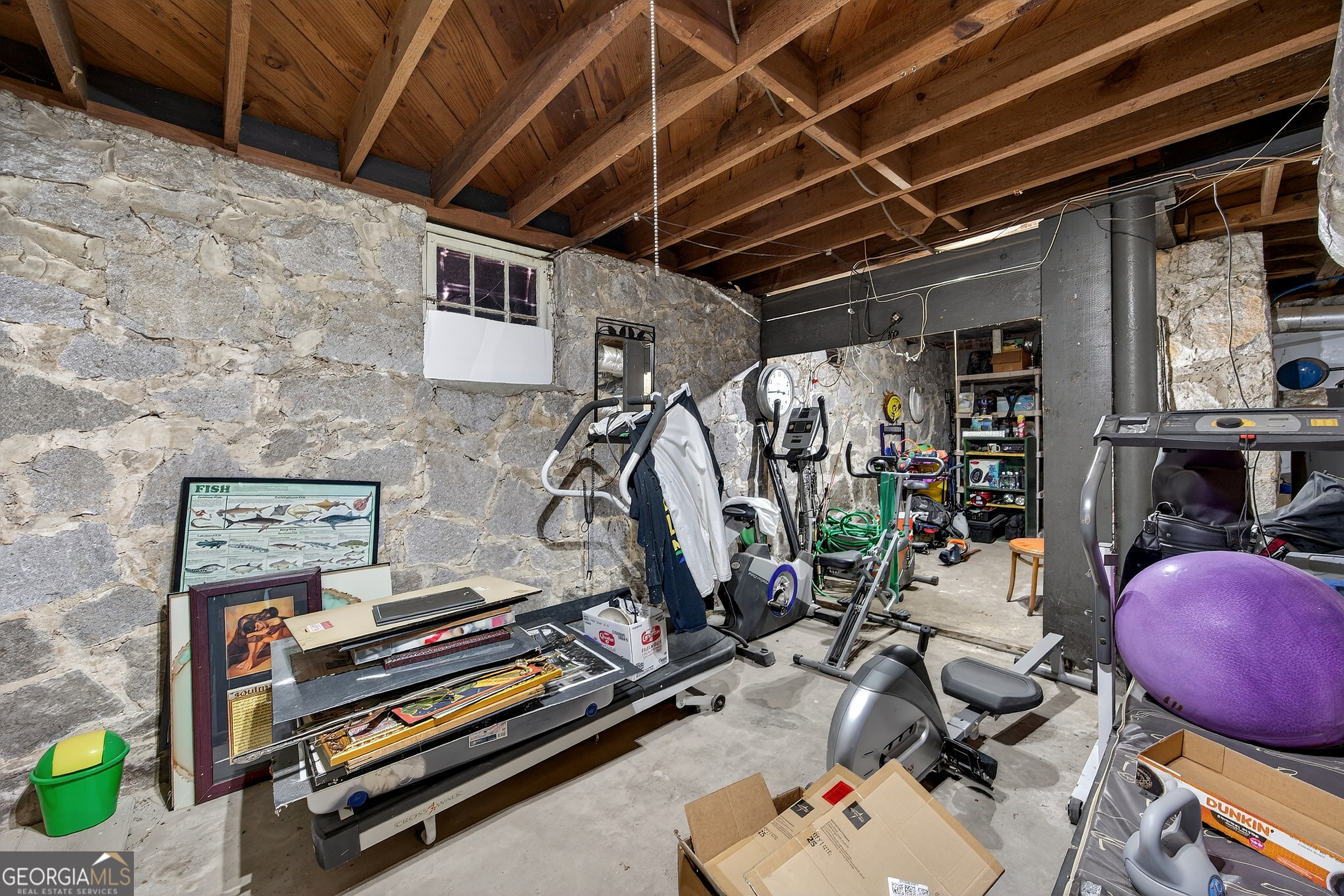 1695 Beecher Street Southwest Atlanta, GA 30310 - Photo 20 of 23 a view of a room with gym equipment