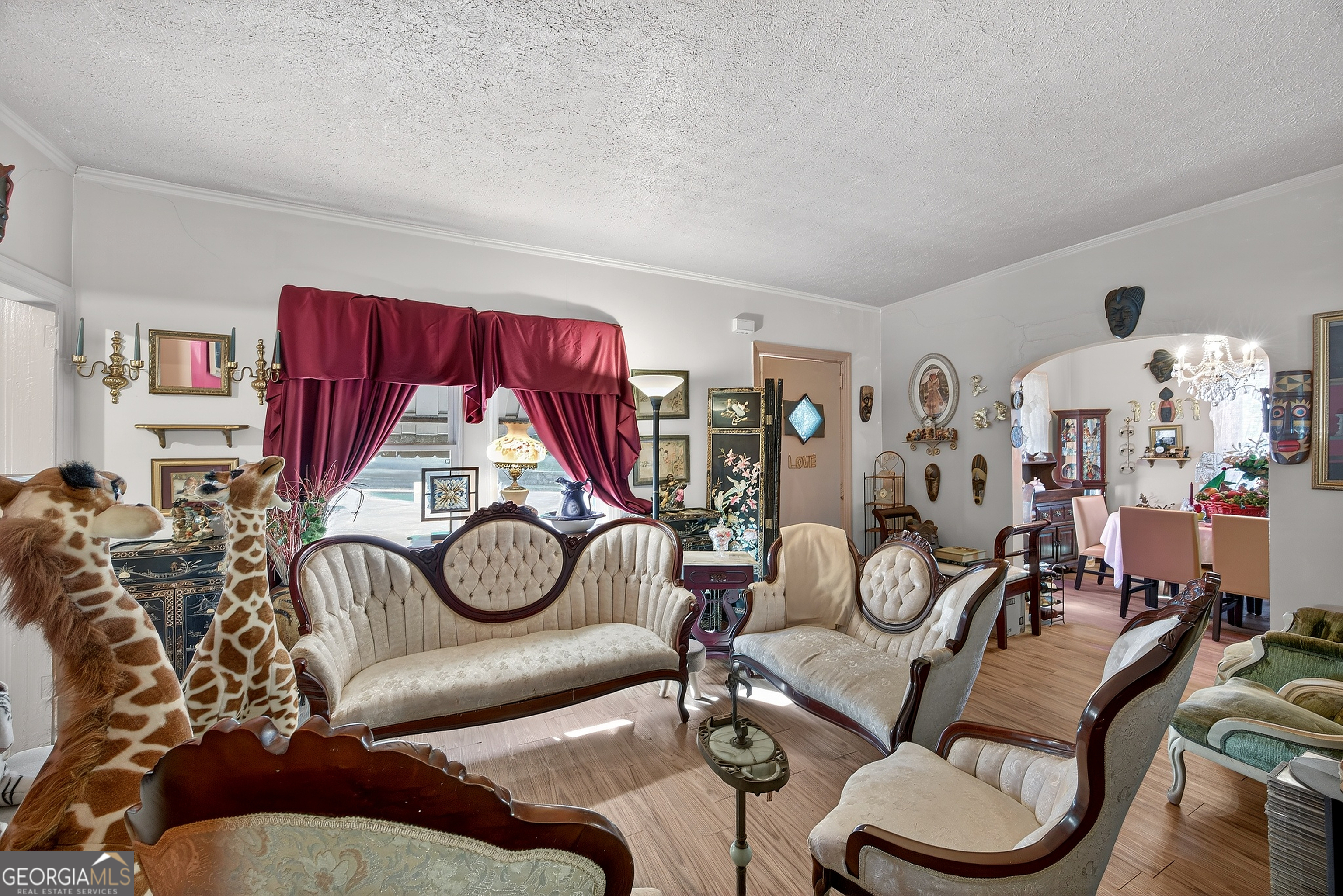 1695 Beecher Street Southwest Atlanta, GA 30310 - Photo 6 of 23 a living room with furniture a rug and a window