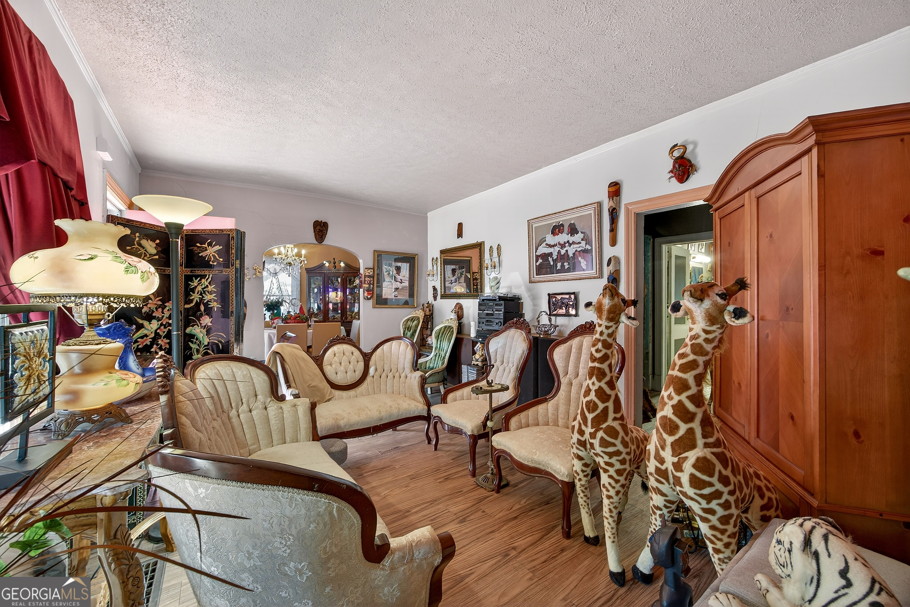 1695 Beecher Street Southwest Atlanta, GA 30310 - Photo 8 of 23 a view of a livingroom with furniture and gym equipment