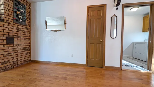 a view of room with window and bathroom