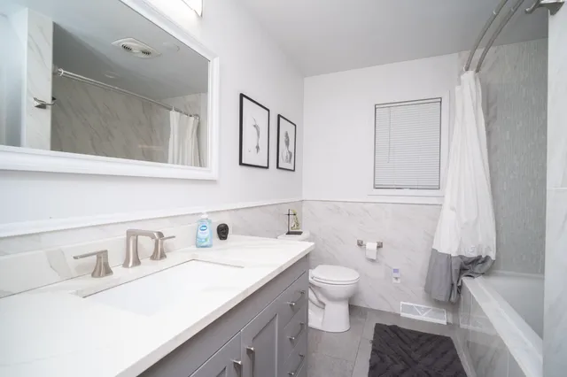 a bathroom with a sink and a toilet
