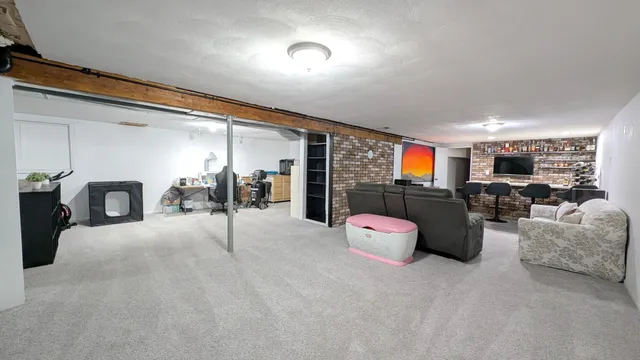 a room with furniture and a window