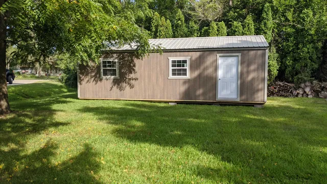 a view of a back yard of the house