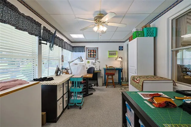 a bedroom with a bed and a dresser in it