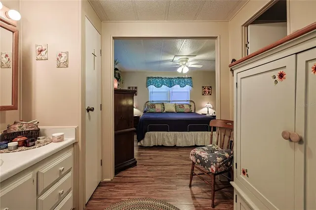 a view of outdoor space with garden and signage