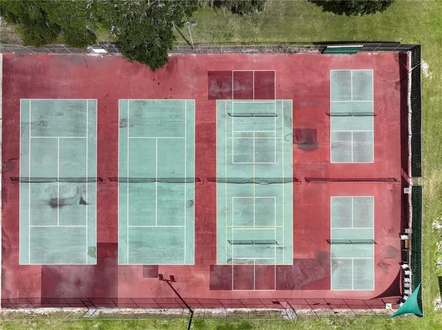 a view of a lake with a yard