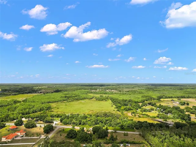 a view of an ocean and a yard