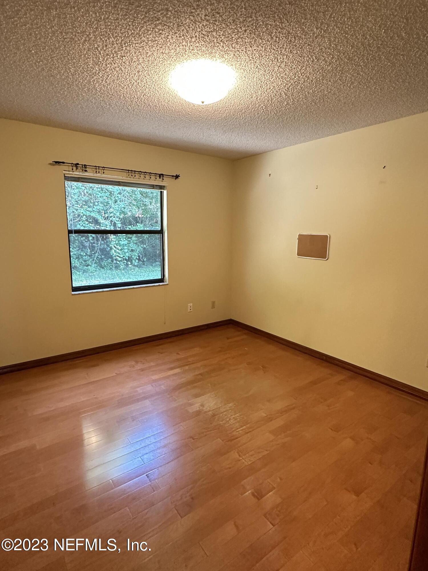 2797 Kings Road St. Augustine, FL 32086 - Photo 13 of 24 an empty room with a window