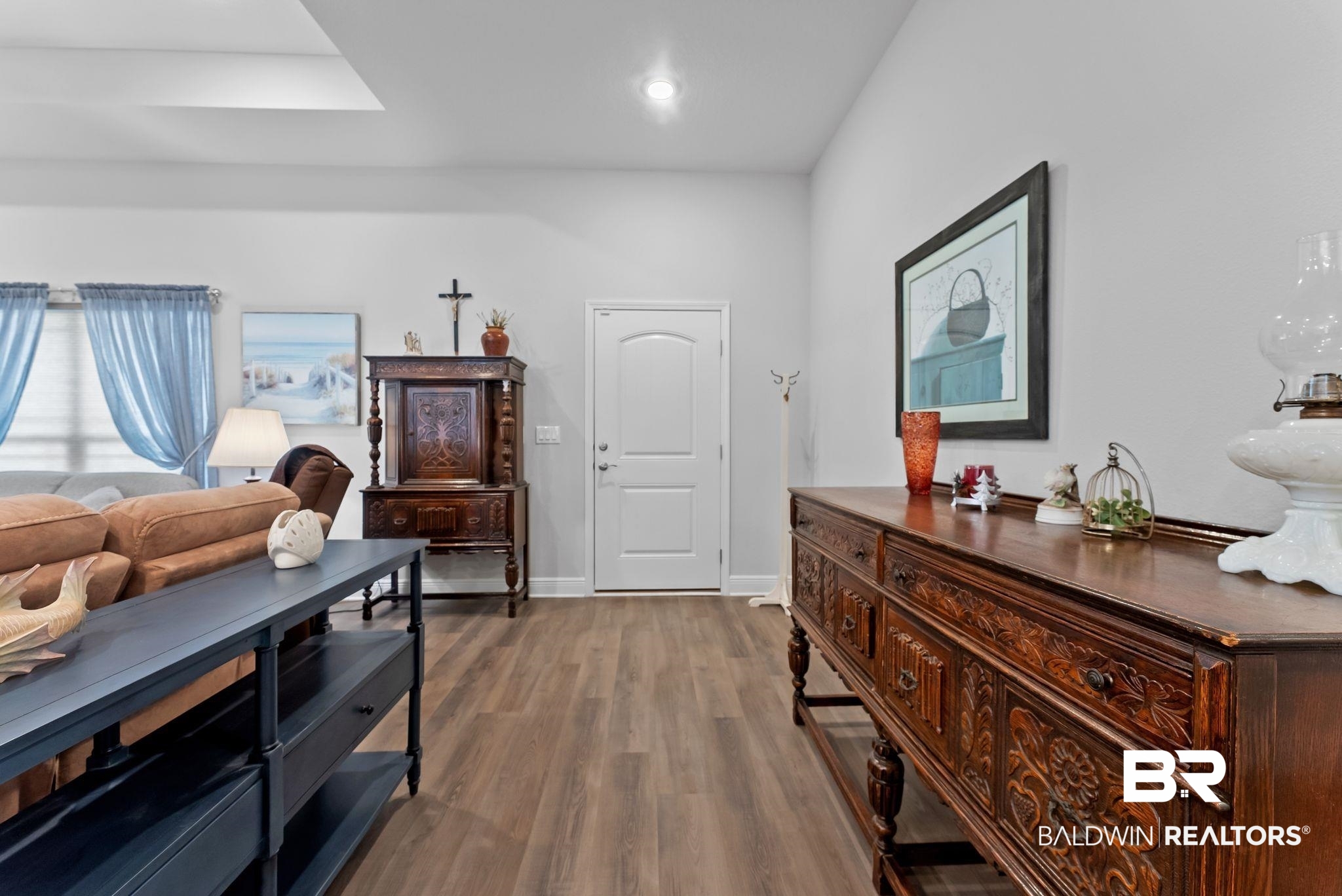 32868 Arbor Ridge Circle Lillian, AL 36549 - Photo 5 of 35 Living room featuring dark wood-type flooring and baseboards