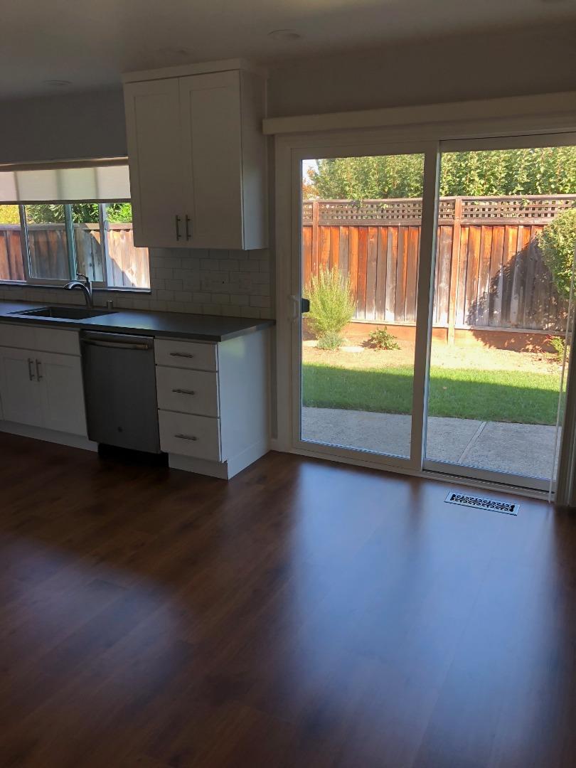 10304 Vista Drive, Unit B Cupertino, CA 95014 - Photo 6 of 16 a kitchen with counter top and outdoor view