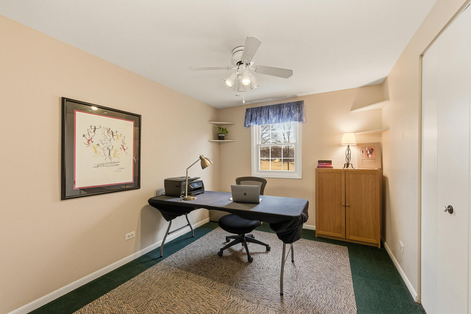 2023 Springside Drive Naperville, IL 60565 - Photo 16 of 16 a view of a workspace with furniture and a window