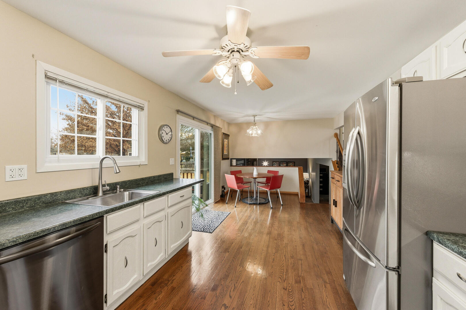 2023 Springside Drive Naperville, IL 60565 - Photo 8 of 16 a kitchen with a sink appliances and cabinets