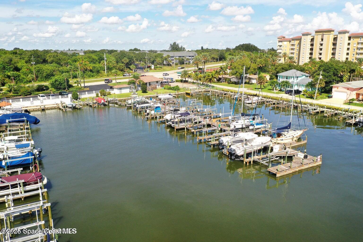 5011 Dixie Highway Northeast, Unit A209 Palm Bay, FL 32905 - Photo 3 of 44 a view of a lake with boats and trees