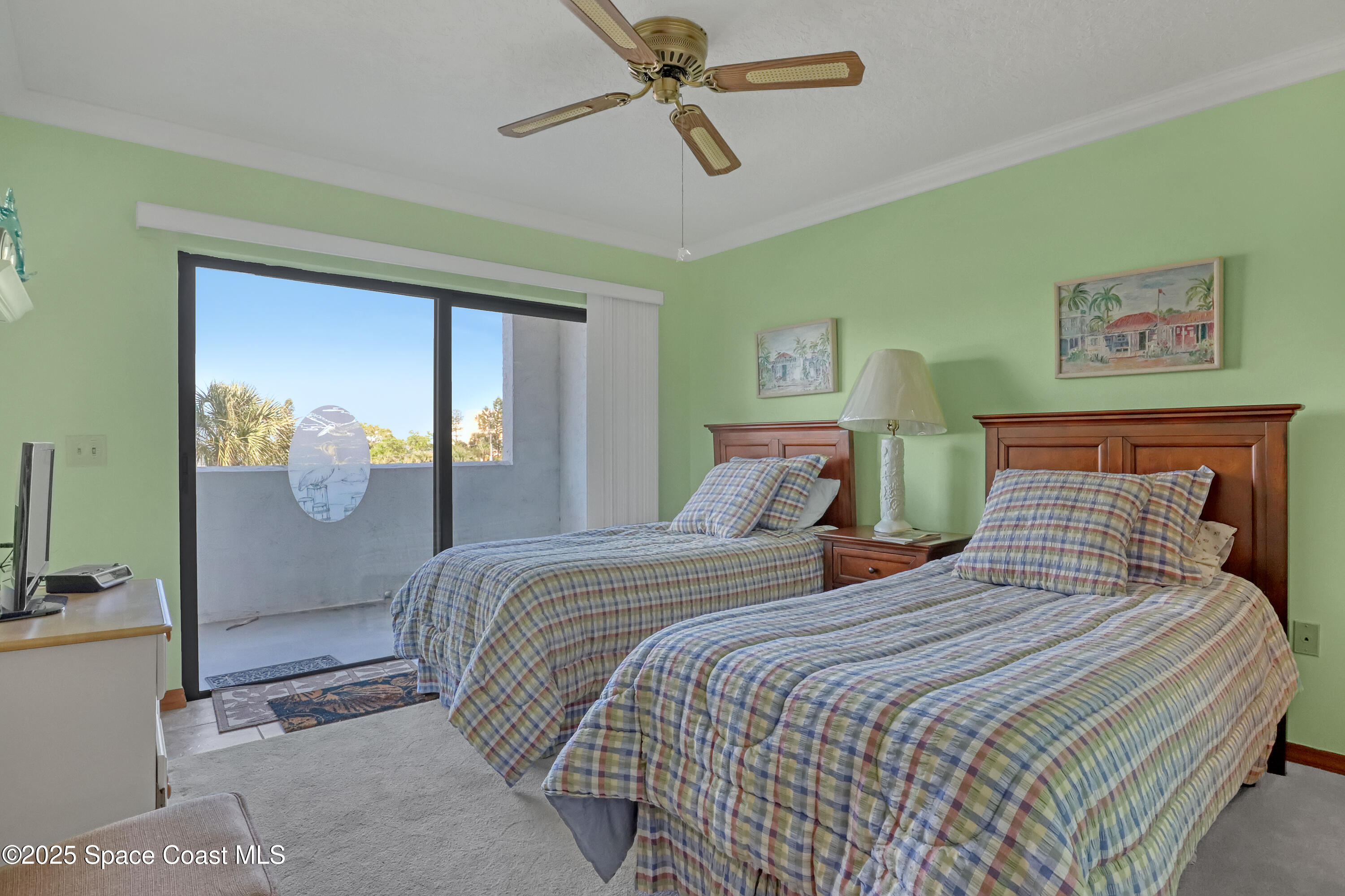 5011 Dixie Highway Northeast, Unit A209 Palm Bay, FL 32905 - Photo 34 of 44 a bedroom with double bed and a window