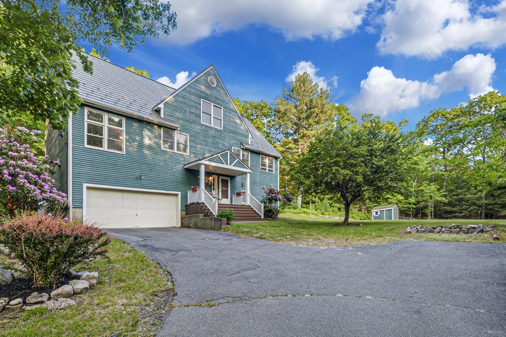 2020 Bay Road Stoughton, MA 02072 - Photo 1 of 38 a view of a house with a yard and large tree