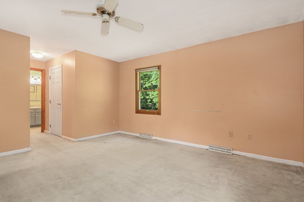 2020 Bay Road Stoughton, MA 02072 - Photo 16 of 38 an empty room with windows and fan