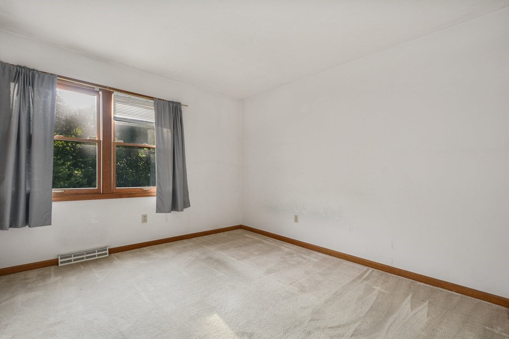 2020 Bay Road Stoughton, MA 02072 - Photo 19 of 38 an empty room with a window