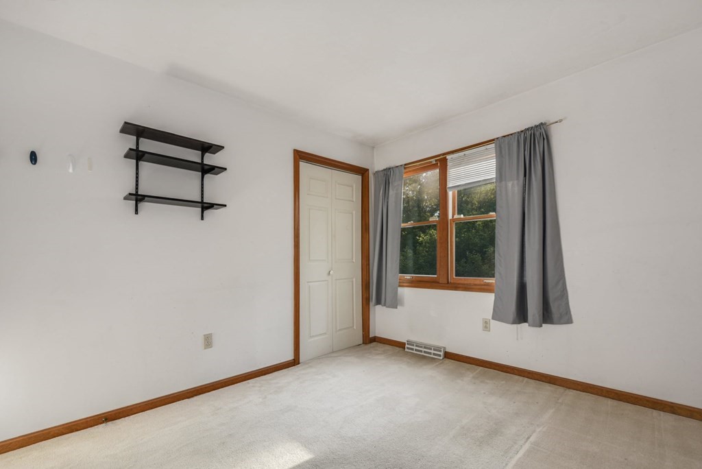 2020 Bay Road Stoughton, MA 02072 - Photo 20 of 38 a view of an empty room with a window