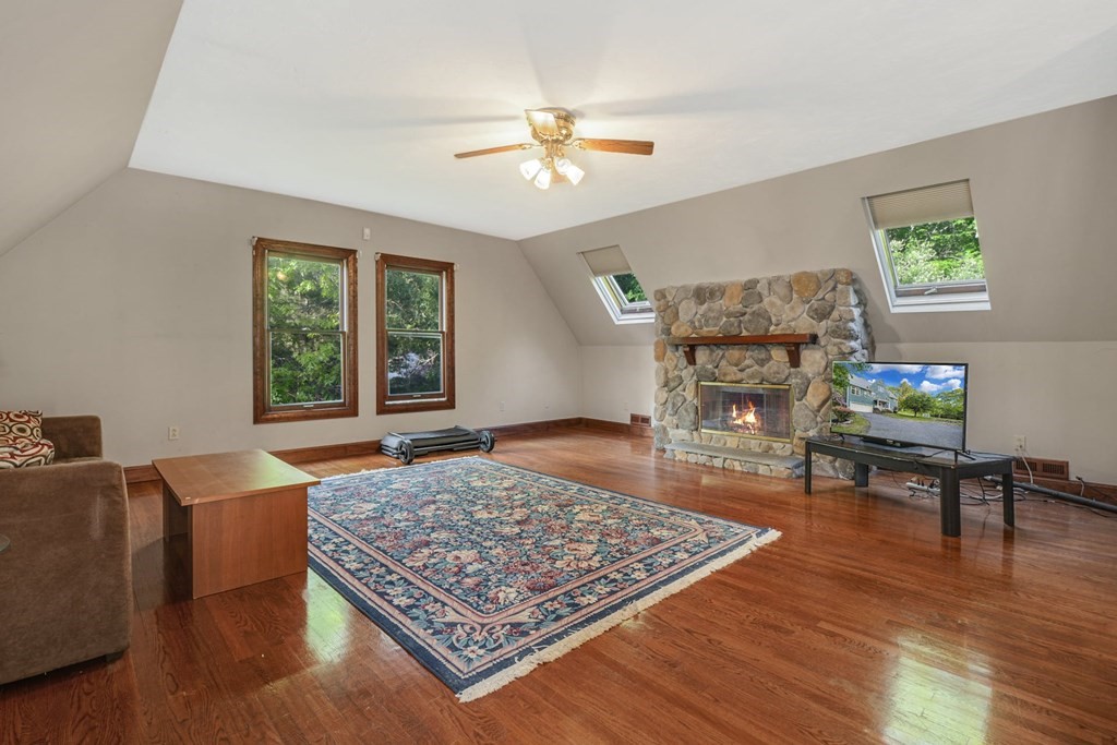 2020 Bay Road Stoughton, MA 02072 - Photo 22 of 38 a living room with furniture and a rug