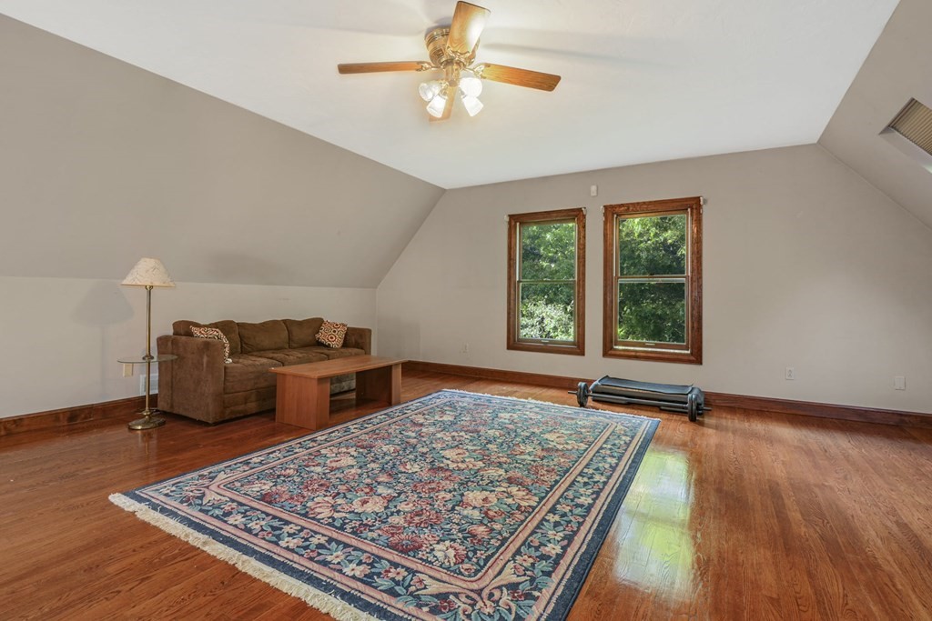 2020 Bay Road Stoughton, MA 02072 - Photo 23 of 38 an empty room with windows and wooden floor