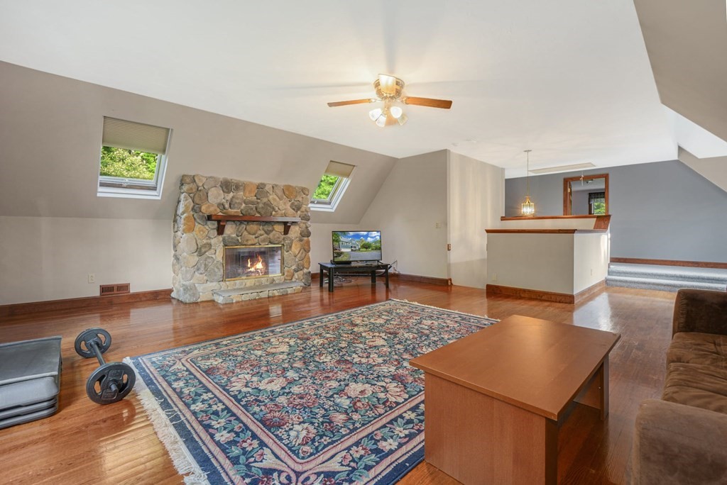 2020 Bay Road Stoughton, MA 02072 - Photo 24 of 38 a living room with furniture and a wooden floor